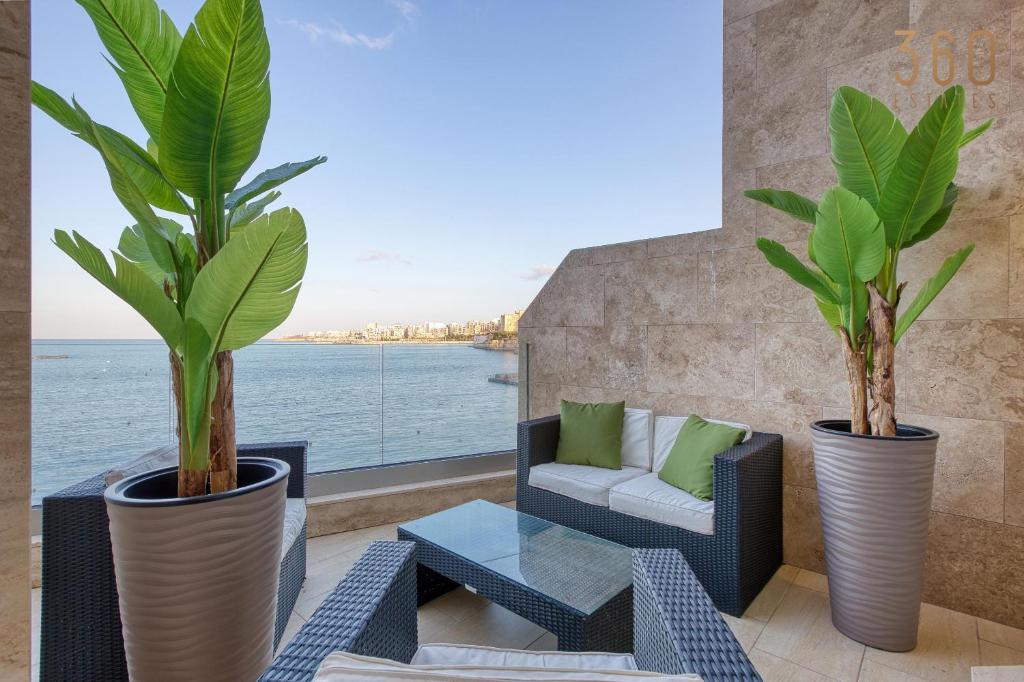 2BR Seafront Elegance with Balcony & Sea Views by 360 Estates