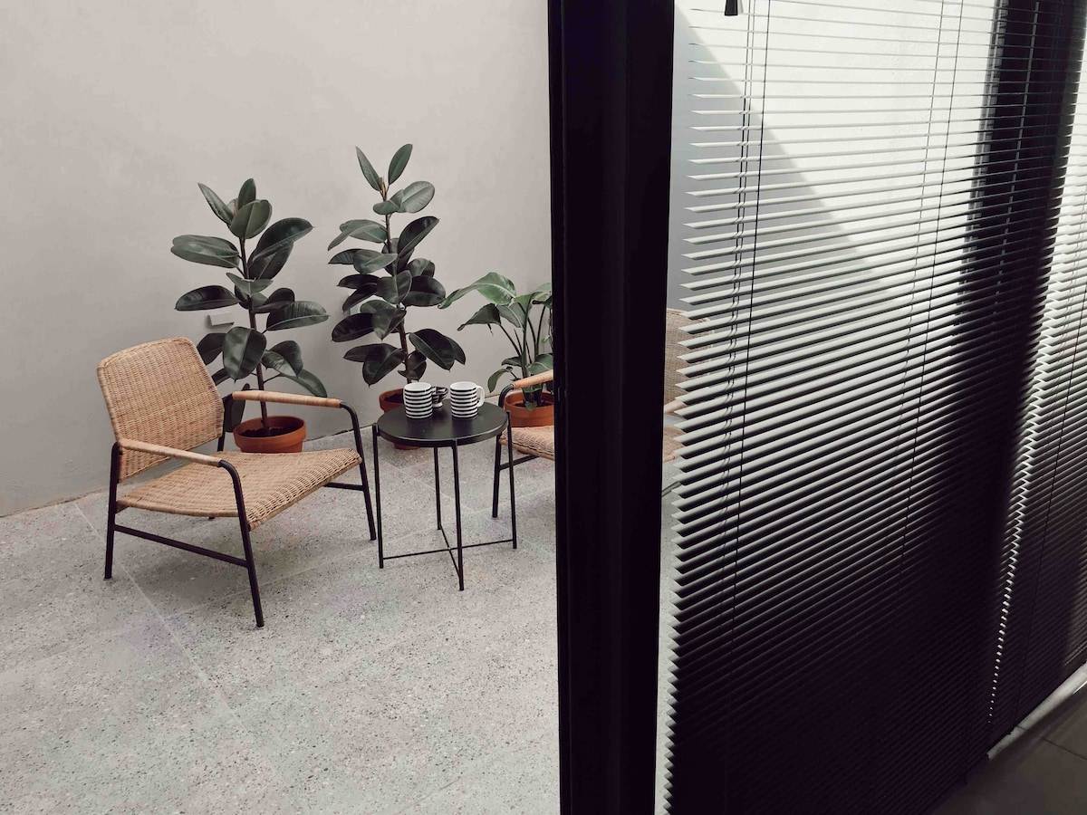 Modern studio apartment with a terrace