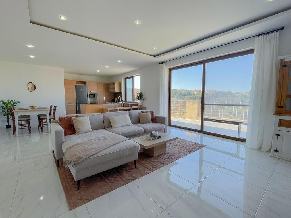 Penthouse with Xlendi Views & Two large Terraces