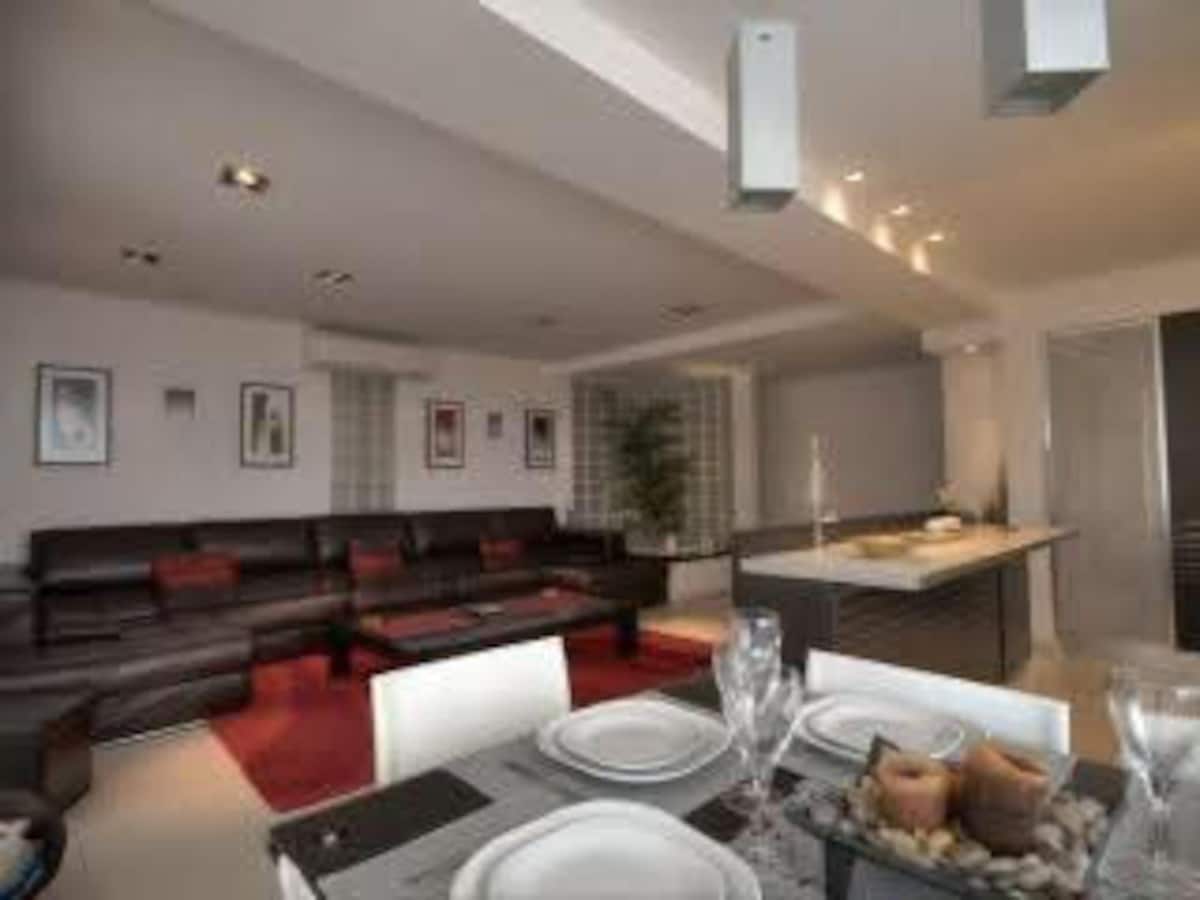 Entire apartment - across the sea and gardens.