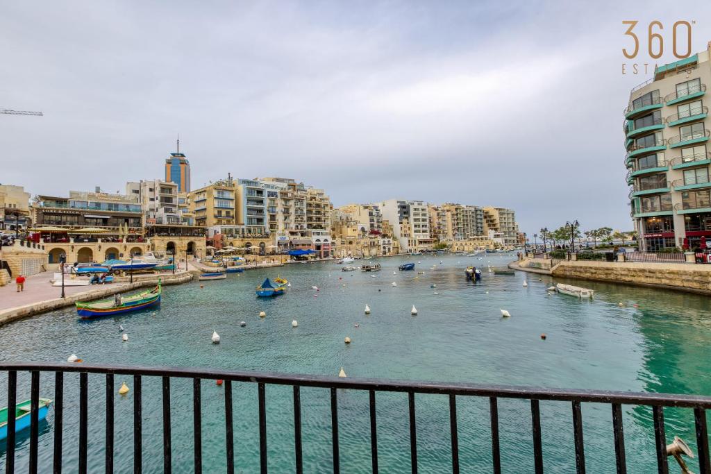 One of a kind, 1BR seafront home in St Julians by 360 Estates