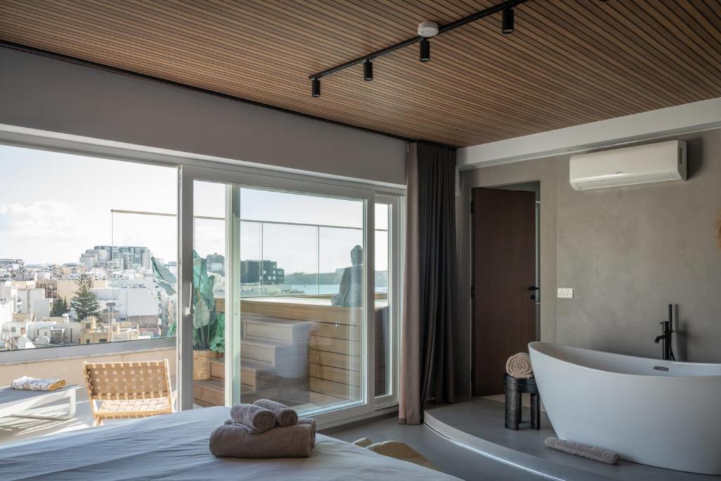 2br luxury penthouse and apartment, each with a terrace, private pool and Valletta views